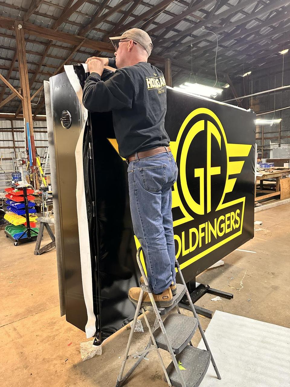 Goldfingers: Cabinet sign in fabrication