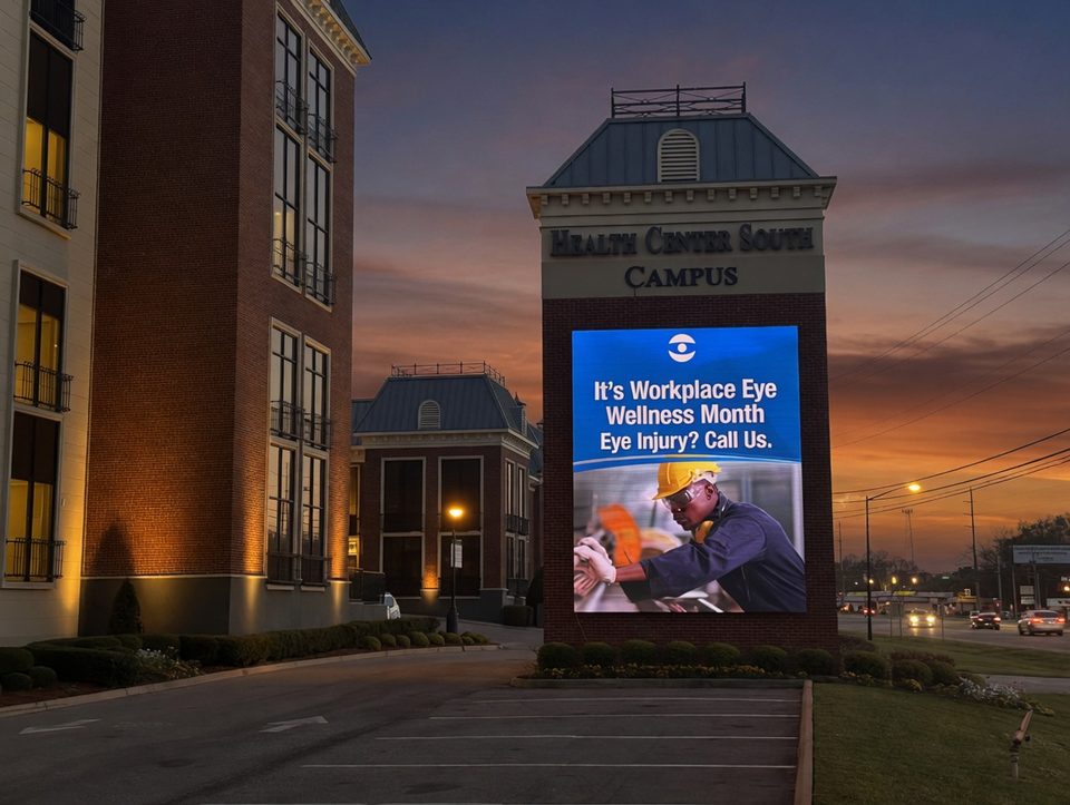 Health Center South Campus: brick tower with a large full-color message center