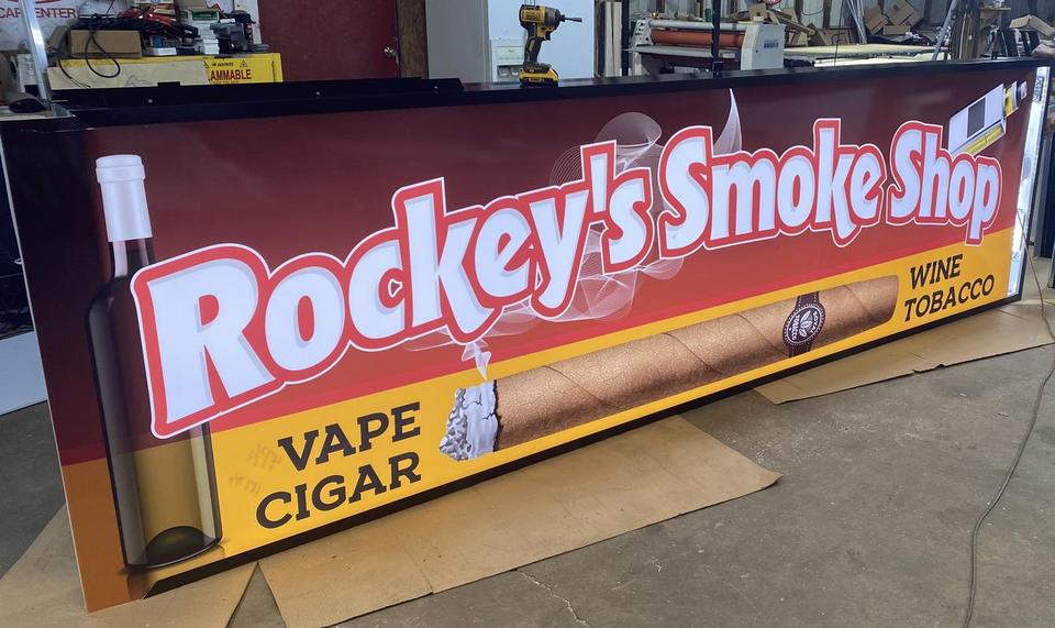 Rockey’s Smoke Shop: Cabinet sign